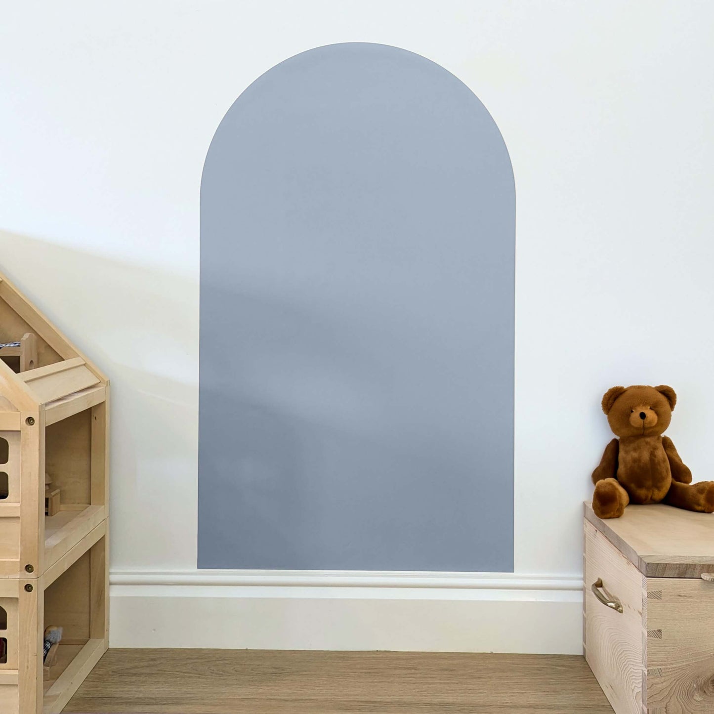 Grey coloured arch shaped wall decal for kids stuck onto a white wall