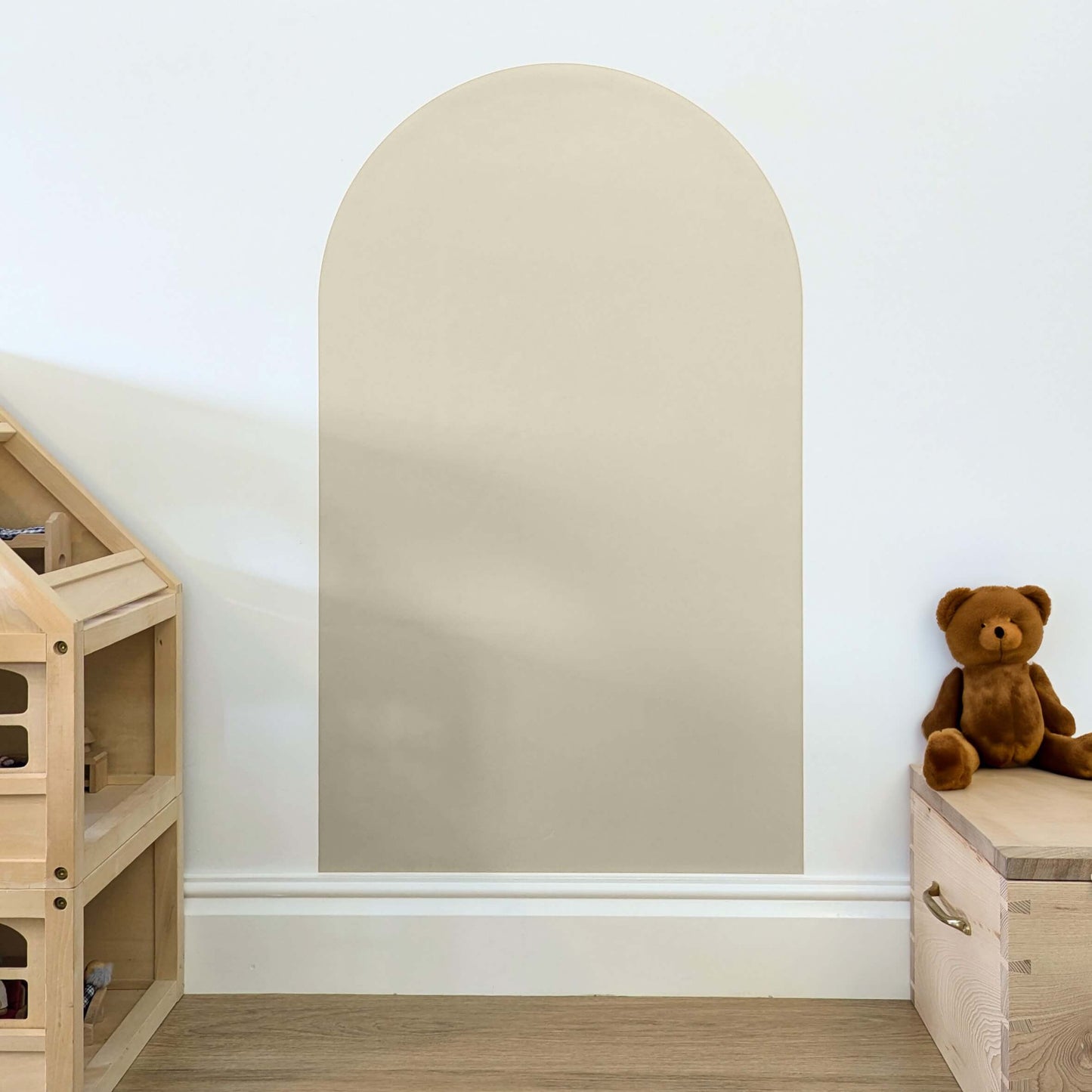 Beige sand coloured arch shaped wall decal for kids fixed onto a white wall