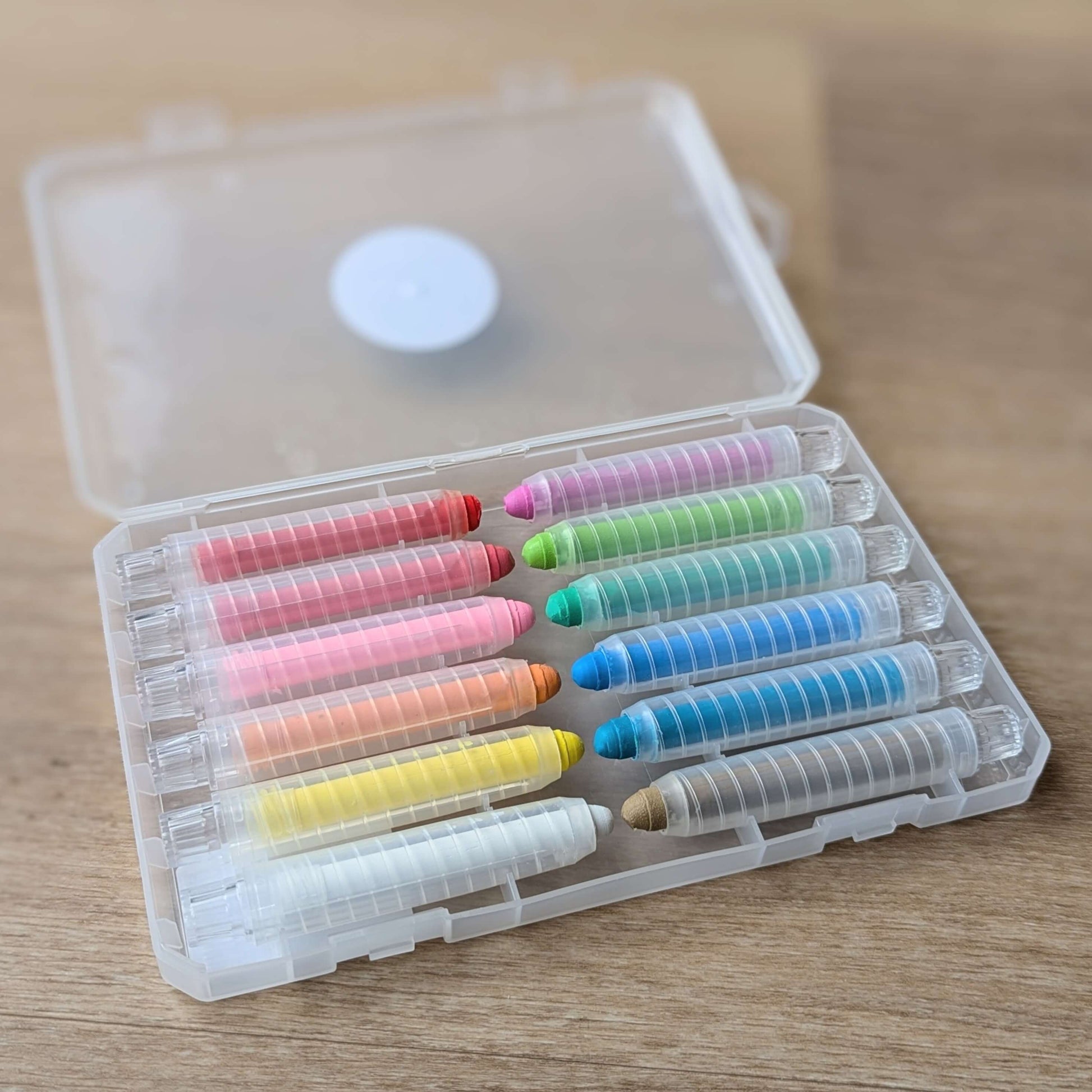 a case of 12 colourful retractable crayons