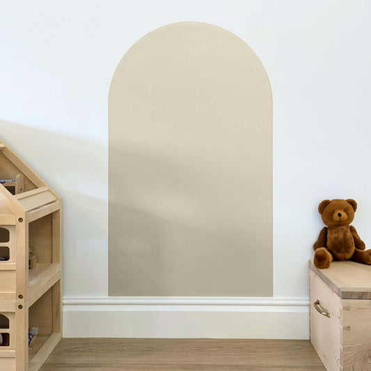 Beige sand coloured arch shaped wall decal for kids fixed onto a white wall