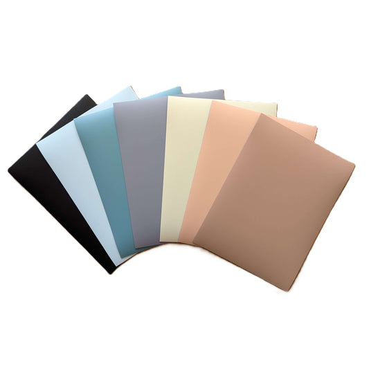 Variations of magnetic decal colour samples in various shades on a white background